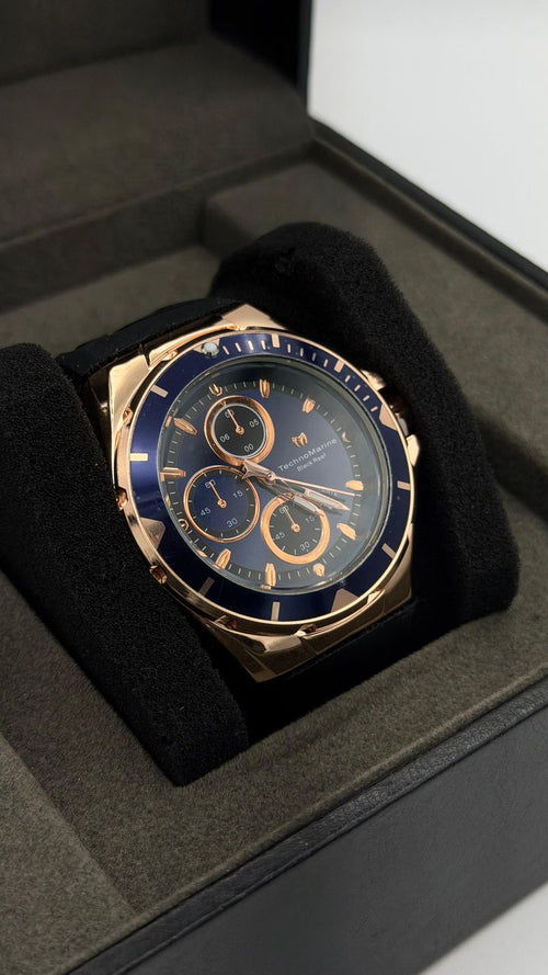 TM OCEAN TABLERO AZUL OSCURO DETALLES ORO ROSA /PULSERA NEGRA