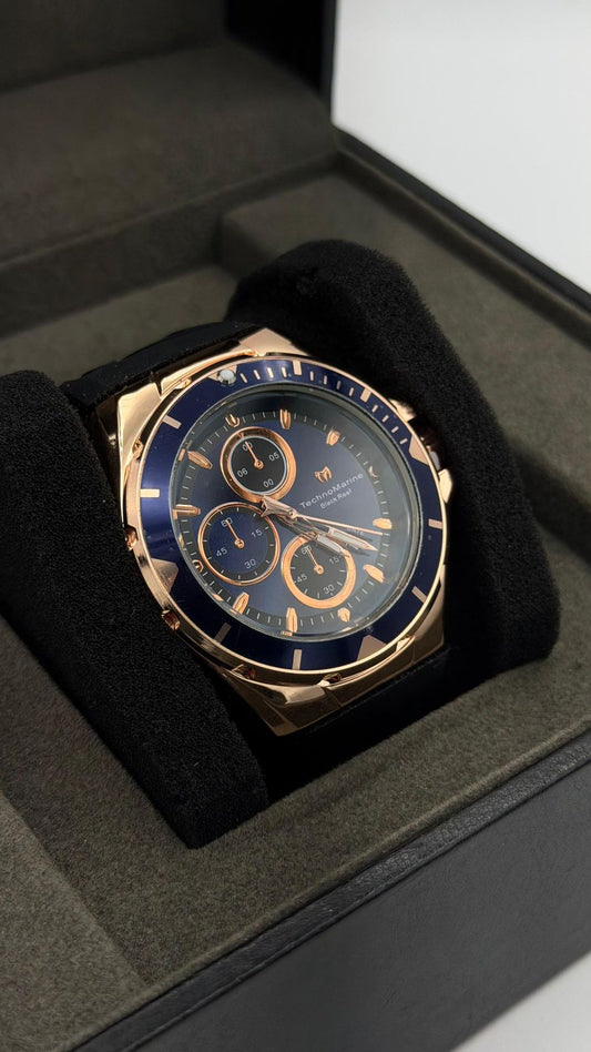 TM OCEAN TABLERO AZUL OSCURO DETALLES ORO ROSA /PULSERA NEGRA