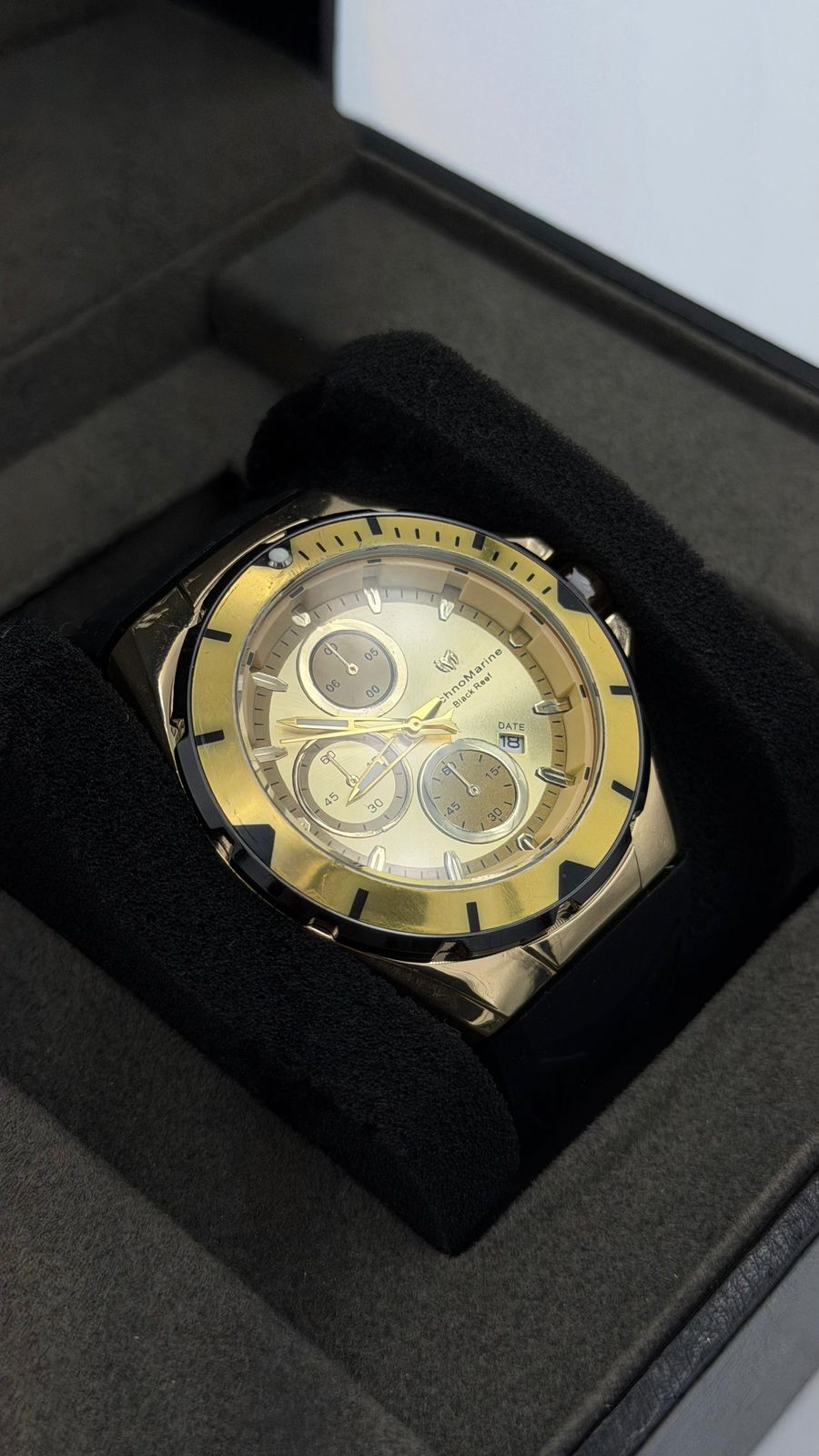 TM OCEAN TABLERO DORADO/PULSERA NEGRA